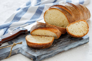 Freshly baked loaf cut into slices.