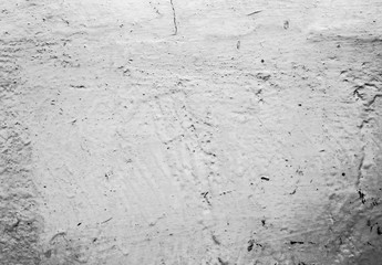 Fototapeta premium Whitewash painted old wall with scratches texture background.