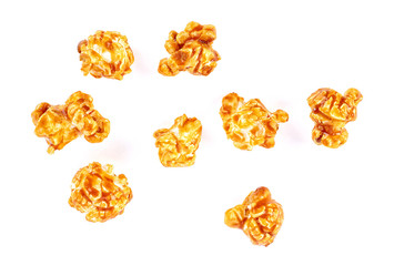 Caramel popcorn isolated on white background - obrazy, fototapety, plakaty