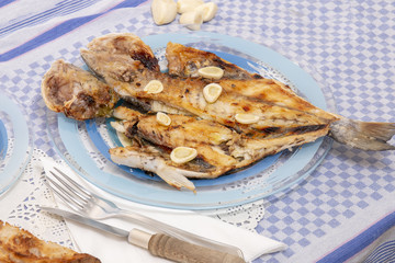 Grilled european seabass with potato
