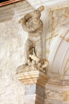 sculpture at the Porta della Carta of the Doges Palace, venice: The doge kneeling in front of Saint Mark's lion, the symbol of Venice