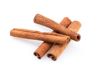 Fragrant cinnamon sticks isolated on white background. Top view.