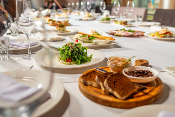 fresh salad with vegetables on a banquet table