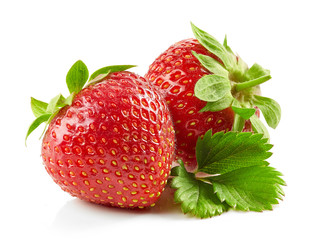 fresh red strawberries with green leaves
