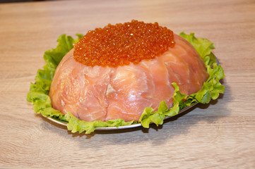 caviar with red fish - seed or trout on green lettuce salad as side dish. healthy food and...