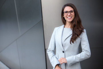 Smart intelligent business woman portrait in glasses, ceo, owner, industry leader, global executive