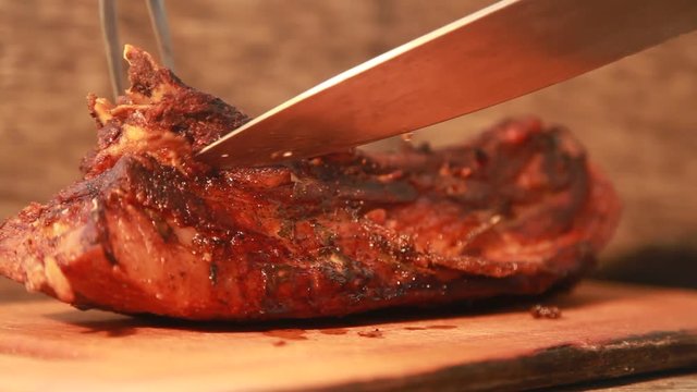 Grilled pork ribs on wooden board