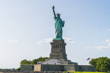 Fototapeta premium The statue of Liberty with blue sky background.