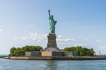 Fototapeta premium The statue of Liberty with blue sky background.