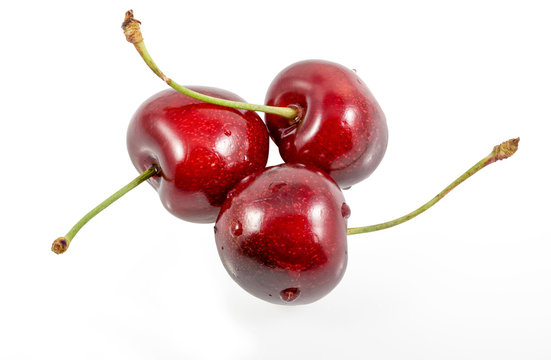 Ripe fresh red cherry, Sweet cherries with drop of water isolated on the white background.