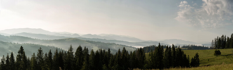 Fototapeta na wymiar Morning mist among the mountain ranges.