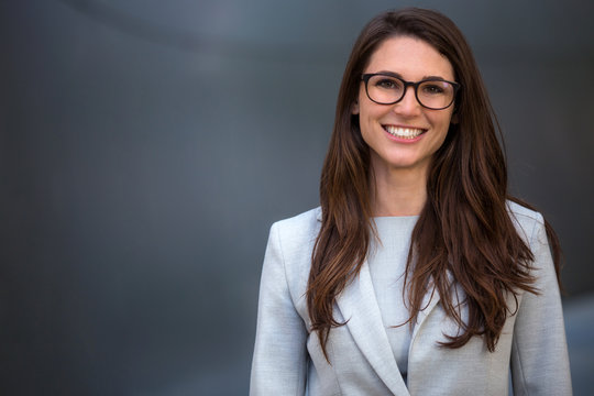 Warm Likable Commercial Friendly Portrait Of A Smart Beautiful Natural Woman, Business Executive Person