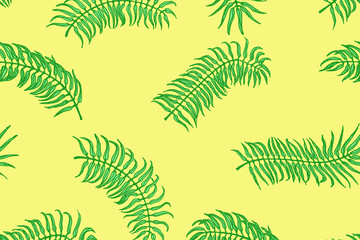 Fototapeta na wymiar Tropical pattern. Palm leaves on the yellow background