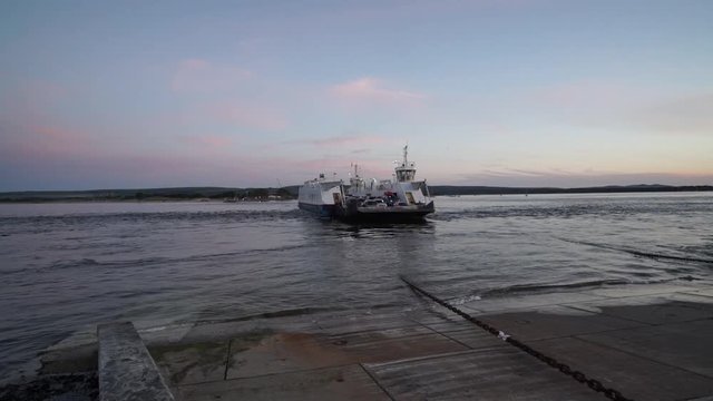 The Sandbanks vehicle & passenger ferry is arriving at Sandbanks from Studland. The ferry connects the Studland Peninsula with the Poole mainland in the UK.