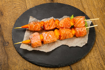 Raw salmon skewer