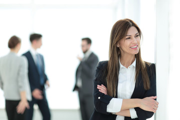 young business woman on blurred office background.