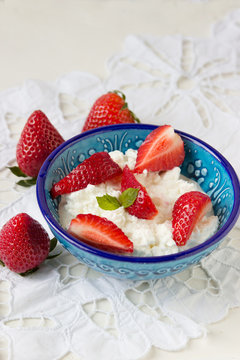 Breakfast: homemade cottage cheese with strawberries..shallow DOF