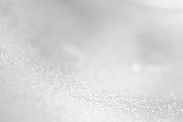 Abstract of Bright and sparkling bokeh background. silver and diamond dust bokeh blurred lighting from glitter texture