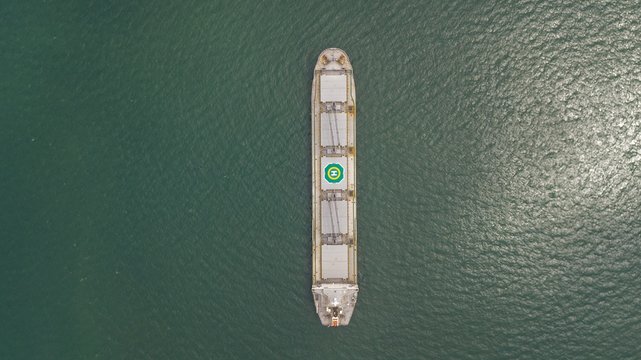 Beautiful Aerial view of the cargo ships in Costa Rica Caldera Dock - Powered by Adobe