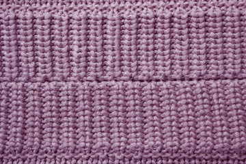 Pink knitting wool texture background.