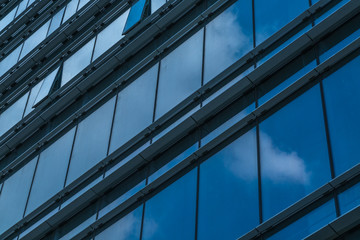 Urban abstract - windowed corner of office building.