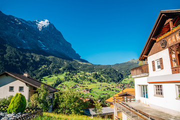 Fototapeta na wymiar Grindelwald village, mountain and house in Switzerland