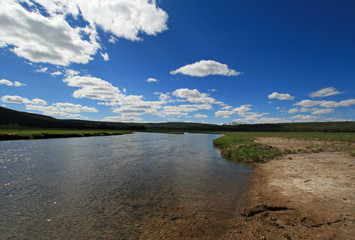 Gibbon River slowly flowing through Gibbon Meadows in Yellowstone National Park in Wyoming United States