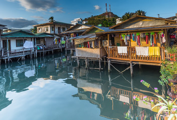 Palawan, Philippines - March 25, 2018: view of residential buildings on stilts in the poor district at  Coron Town at Busuanga Island Palawan Philippines.