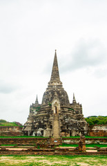 Fototapeta premium AYUTTHAYA, THAILAND - 10 June 2018 - The ruins of the old temple in Ayutthaya historical park, Ayutthaya, Thailand.