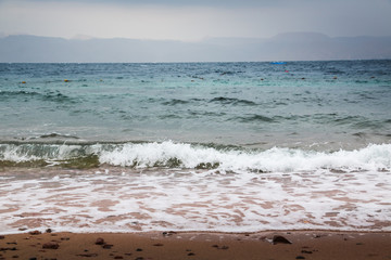 Sea and wave in cloudy weather