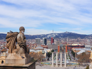 Photo taken in Barcelona, Spain on March 20, 2018. Statue of a woman looking towards the city of Barcelona