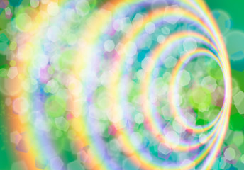 Fototapeta na wymiar Green background with bokeh and rainbow