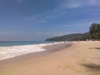 Beach on the island of Phuket with emerald water