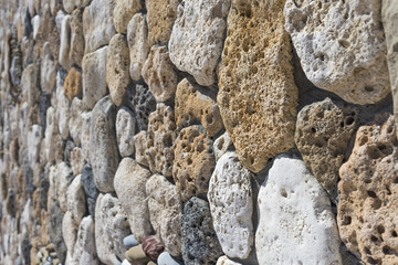 texture of a stone wall close-up, background, selective focus