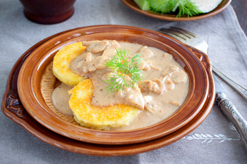 Potato cutlets with mushroom sauce, selective focus