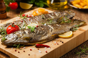 Grilled whole trout. Served with baked potatoes.