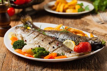 Grilled whole trout. Served with baked potatoes.