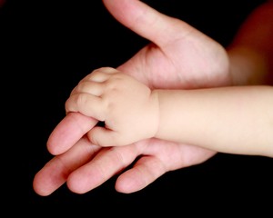 father and son, hand in hand