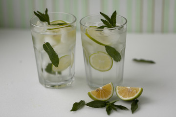 Cold fresh cocktail with lime and mint