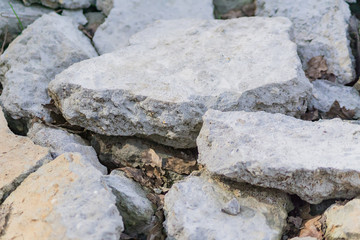 close up of pile of gray stones outdoors