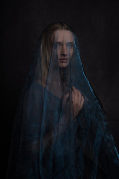 Studio portrait of woman wearing veil