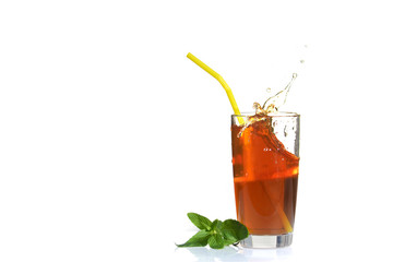 Splashes of iced tea from lemon slice on white isolated background.