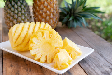Pineapple on the wood  background