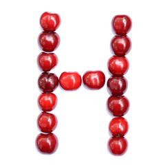 Letter H made with cherries to form a letter of the alphabet. Berry letters on a white background.