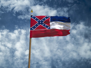 Mississippi flag USA flag Silk waving flag made transparent fabric of Mississippi US state with wooden flagpole gold spear on background blue sky white smoke clouds real retro photo 3d illustration