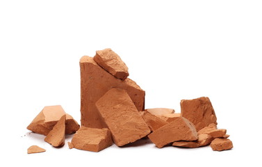 Shattered brick pieces isolated on white background