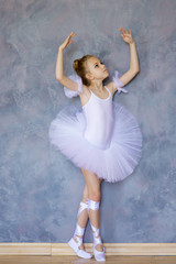 Little girl ballerina in white tutu