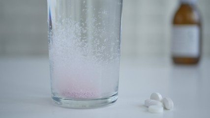 Effervescent Pill Dissolved in a Glass of Water