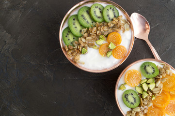 Natural homemade yogurt with ground-cherry on a wooden table.