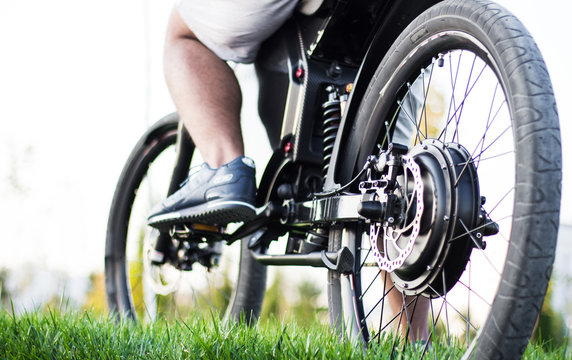 Man Biker Sitting On Electric Bike